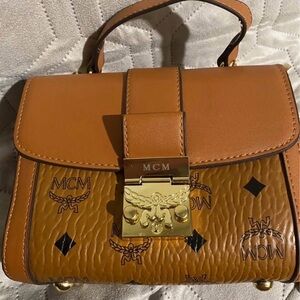 MCM Brown Leather Crossbody Bag with Gold Accents like new